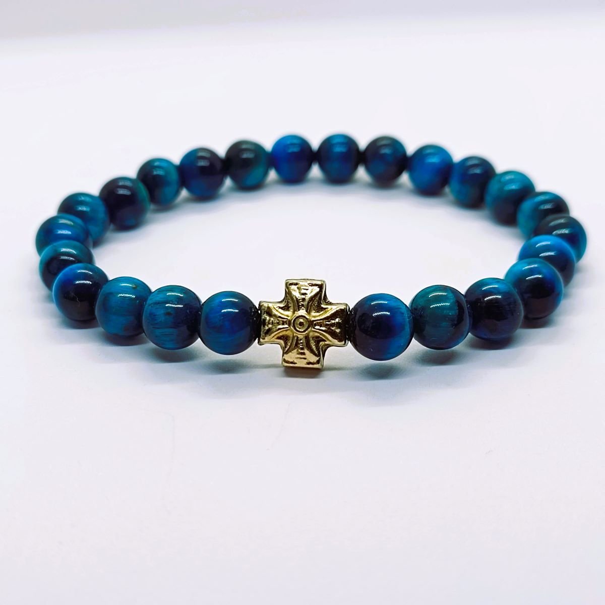 Brojanica za ruku plavo tigrovo oko prve klase 8mm zlatni krstic poludragi kamen